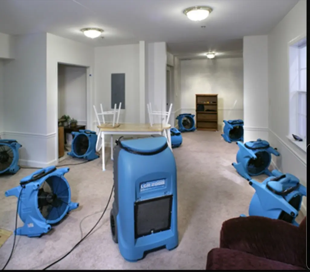 Air movers and dehumidifier setup for Water Damage Restoration in Country Walk